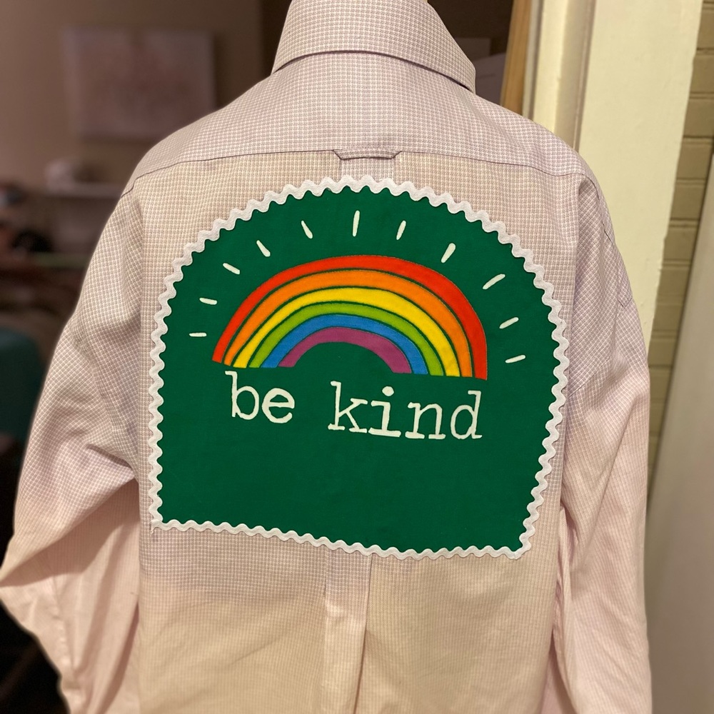 Upcycled shirt. Light purple plaid with rainbow “Be Kind” emblem